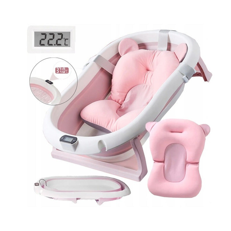 Cadita pliabila cu termometru incorporat si PERNA INCLUSA, Dimensiuni 83 x 50 x 20 cm, Material PP/TPE, Pliere rapida, Usor de utilizat, Picioare antiderapante, Varsta 0-3 ani, Structura Solida, Culoare Roz